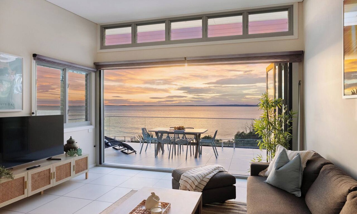 Hyams Beach House | Allure: Panoramic beachfront views. Sunrise views over the ocean at Hyams Beach