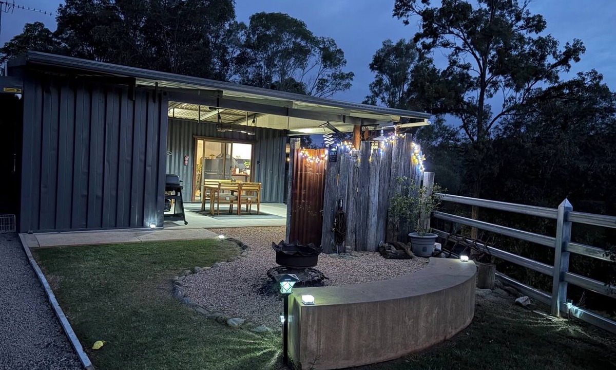 Wamuran Basin Cabin | Hayden's Place is a cozy tiny off‑grid home offering stunning 180° views.