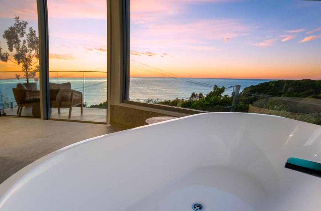 Coolum Beach Apartment | Oceanfront luxury apartment with views, king bed & private balcony