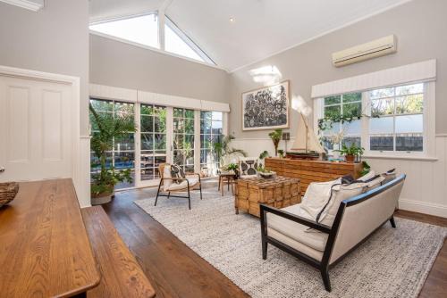 Sandringham House | Sandy Village Retreat Heated Pool Bay Views