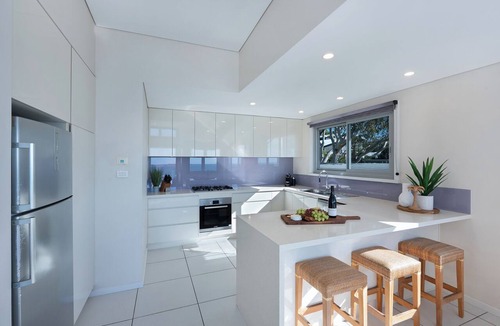 Hyams Beach House | Allure: Panoramic beachfront views. Sunrise views over the ocean at Hyams Beach