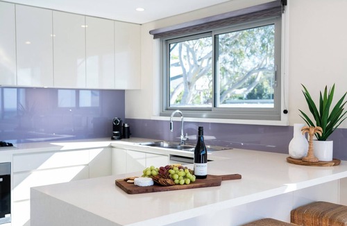Hyams Beach House | Allure: Panoramic beachfront views. Sunrise views over the ocean at Hyams Beach