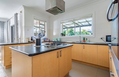 Rosebud House | Avenues Getaway ~ King beds, pet friendly and always happy guests.