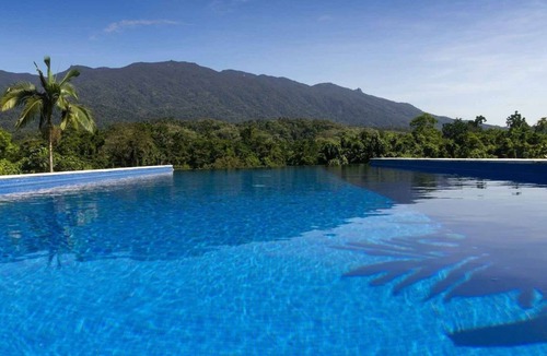 Miallo House | Bali Hai A private retreat on acreage, close to town, ocean & the rainforest