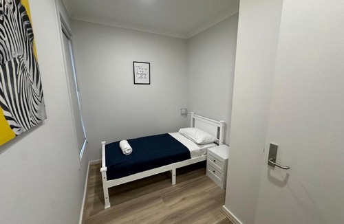 Beveridge House | Connecting Palms - Bevridge- Disability Friendly Holiday Home!