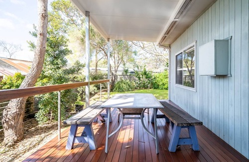 Broulee Apartment | Cosy Getaway with Fireplace and Spacious Backyard