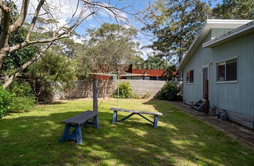 Broulee Apartment | Cosy Getaway with Fireplace and Spacious Backyard