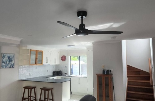 Tin Can Bay Apartment | Delightful three bedroom unit by the beach. Beautiful sunsets