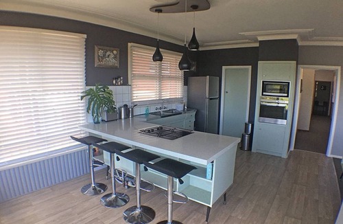 Mount Ousley House | Drift - Artistic retro beach inspired house