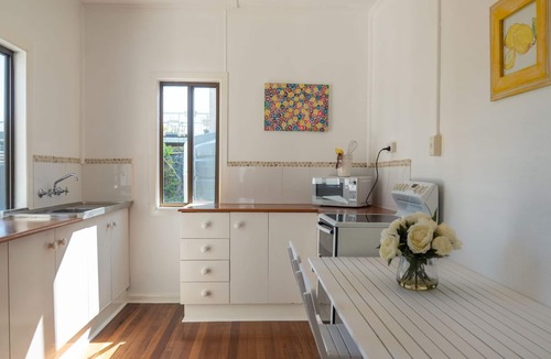 Red Rock House | Escape to Red Rock – A Classic Coastal Cottage Steps from the River & Beach.