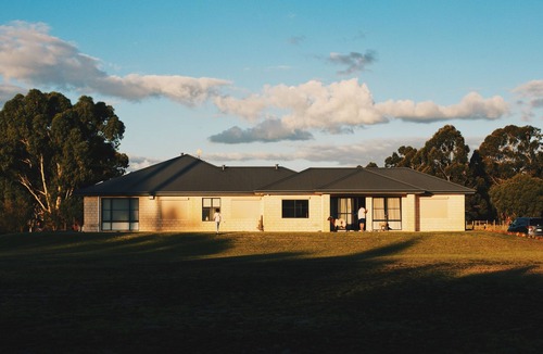 Oakford House | Family Farm Stay with Animals, Playground and Firepit