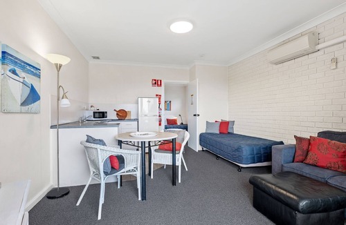Narooma Apartment | Golfers View Unit 1 - enjoy spectacular views of the ocean and golf course.