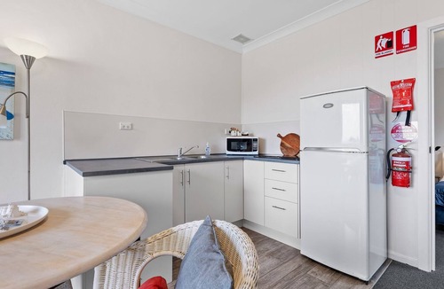 Narooma Apartment | Golfers View Unit 1 - enjoy spectacular views of the ocean and golf course.