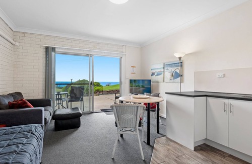 Narooma Apartment | Golfers View Unit 1 - enjoy spectacular views of the ocean and golf course.