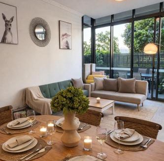 Sydney Olympic Park Apartment | High Ceiling 6 Beds Private Garden Oasis 1min to Qudos Free Parking