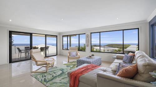 Emerald Beach House | Lighthouse at Emerald Beach - Ocean Views, walk to beach