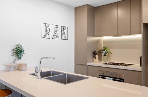 Sydney Olympic Park Apartment | Luxury 2BR Oasis – Panoramic CBD & Park Views