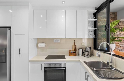 Cairns North Apartment | Luxury Beachfront Apartment with Direct Pool Access
