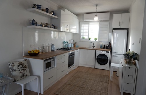 Glenelg North Apartment | Luxury Couples Retreat Beach Front Apt with Ocean View Balcony