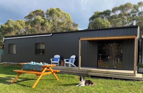 Mount Doran House | Man Cave with a touch of Lux. and an open fire.