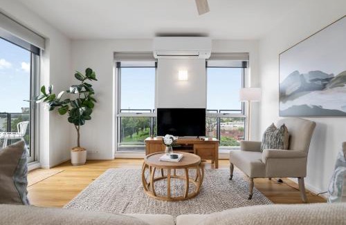 East Melbourne Apartment | Modern 1BR Apt with Generous Balcony, Parking & Pool