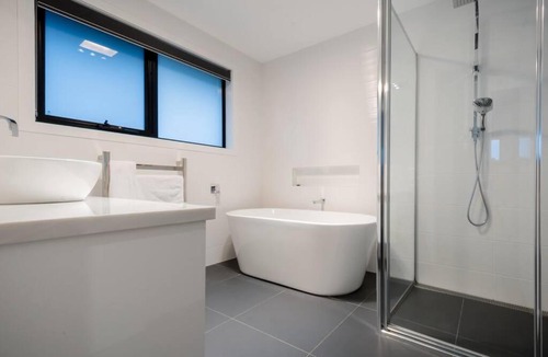 Newstead Apartment | Modern Home for large groups or families. Parking