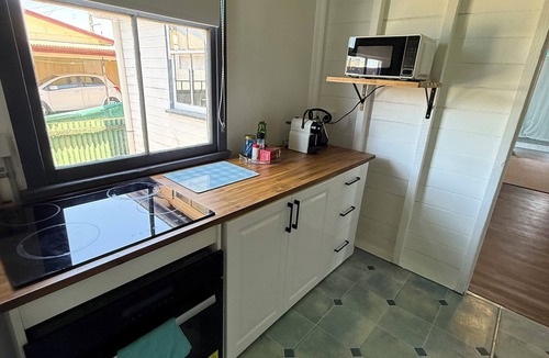 Mareeba House | neat and tidy historical workers cottage