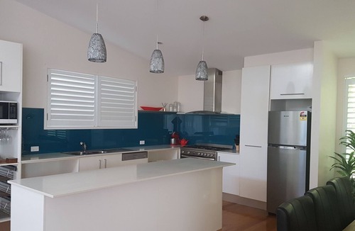 Rainbow Beach House | Perfect location! Perfect family home with a pool & air conditioning.