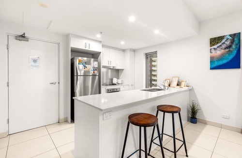 Darwin City Centre Condo | Reef-side Splendor: City Vistas ~ Pool ~ Workspace