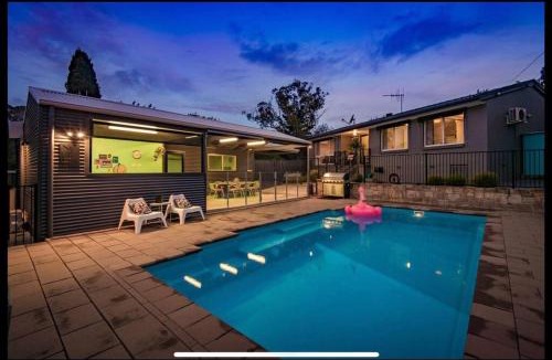 Hughes House | Resort style home pool spa sauna