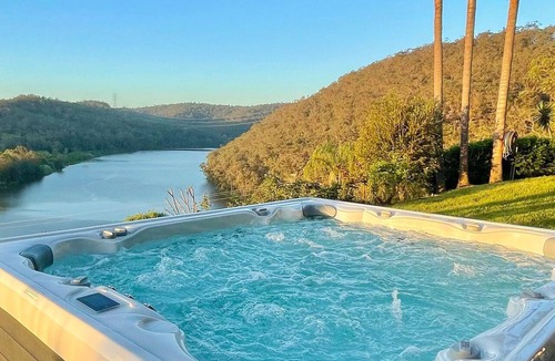 Lower Portland House | River Point Retreat | Breathtaking views in nature with pool, hot tub, firepit