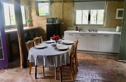 Tanja Cottage | Rustic mudbrick cottage in a quiet bush setting, near Tathra. 2 beds, sleeps 4.