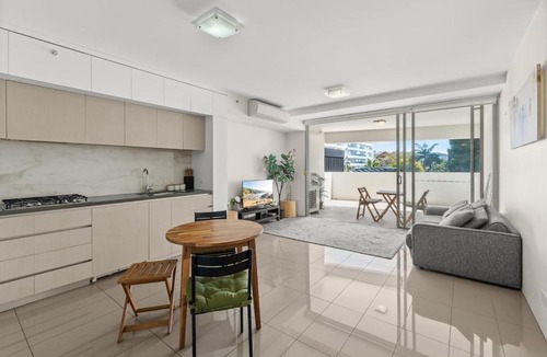 West End Apartment | Stylish Riverside Haven with Parking Gym & Pool