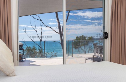 Denhams Beach Apartment | Unbeatable ocean views from beautiful private apartment on Denhams Beach.