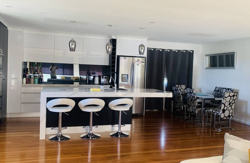 Banksia Beach House | Water front Property with magical sunsets and water front walking and bike paths