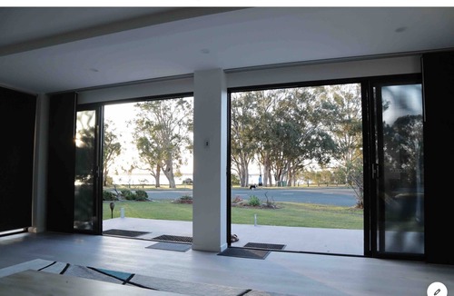 Banksia Beach House | Water front Property with magical sunsets and water front walking and bike paths