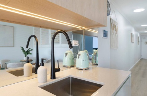 The Entrance Apartment | Waterfront, Pool, Balcony, Prime Location
