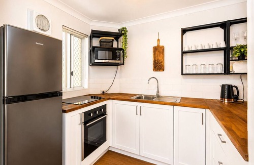 Fremantle Apartment | Welcome to Magical McAtee, a stylish resort-style apartment just 5 minutes from the heart of Fremantle. Relax by the sparkling pool, enjoy a luxurious king bed, free parking, fast Wi-Fi and a fully equipped kitchen. Perfect for couples or sol