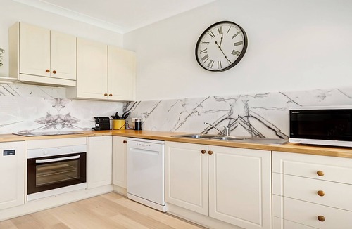 Culburra Beach House | Windspray – ocean views from kitchen and living