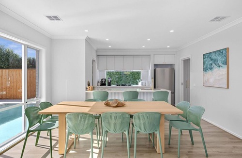 Curlewis House | Yellow door pool retreat – Sleeps 12, Heated Pool, Family Friendly