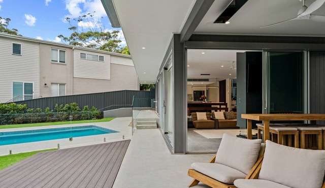 Architectural Lakefront Pool Home in North Avoca