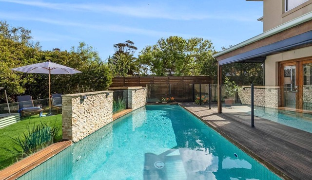 Beach Living Bliss – Pet-friendly stay with a pool, steps from the sand