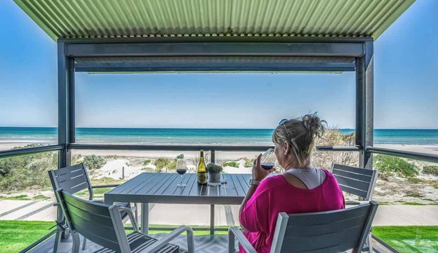 Beachfront ocean-view apartment with balcony