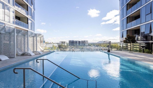 Elegant 3BR Retreat with Pool, Parking & Balcony