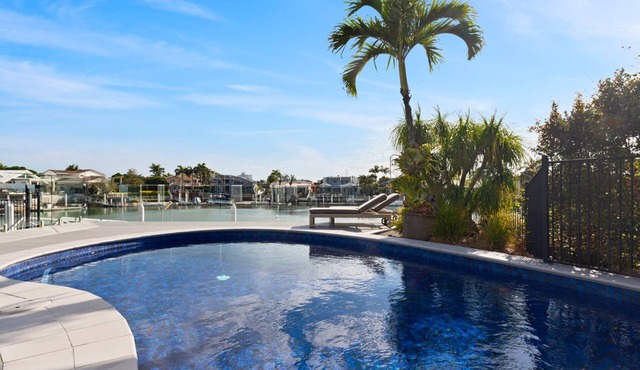 Luxurious Waterfront North Facing 5 bedroom House with pool, pontoon and Deep Water Access in Minyama