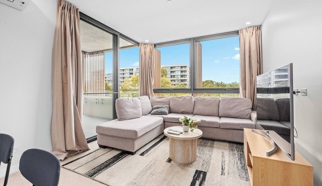 Modern 2BR Living with EV Charging and 7-Min to Tram