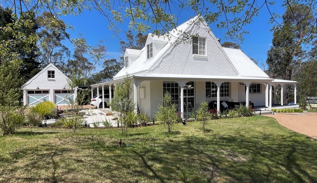 Serene original country cottage nestled on 2 acres in the NSW Southern Highlands