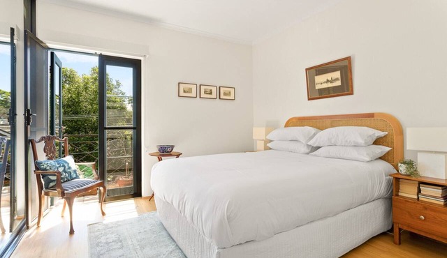 Spacious 2-Bed Townhouse with a Lush Courtyard
