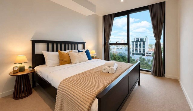 Spacious South Melbourne Apartment with 1 Bedroom, 2 Queen Beds, City and Bay Views, Near CBD and Beach
