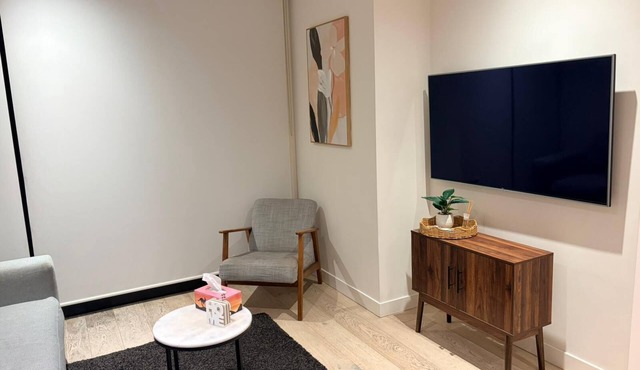 Stylish full apartment | Walk to CBD & Marvel Stadium | Opposite Train Station